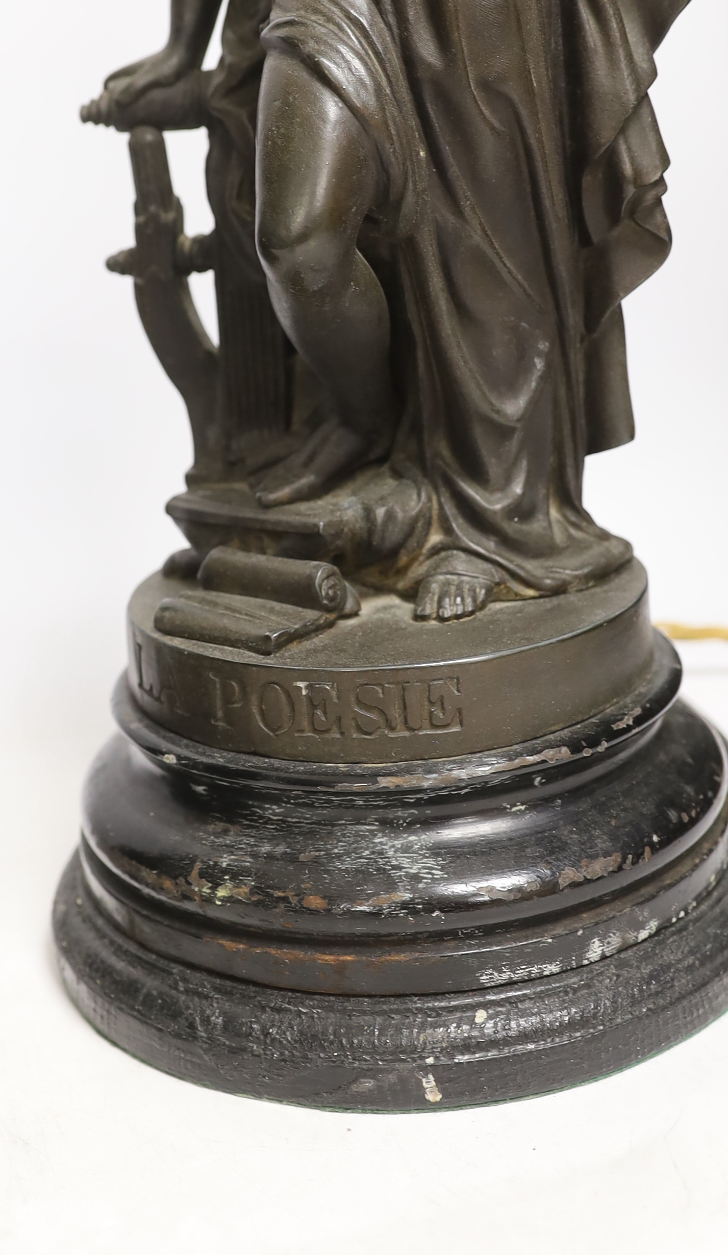A pair of spelter figural table lamps emblematic of poetry and history, overall 56cm high